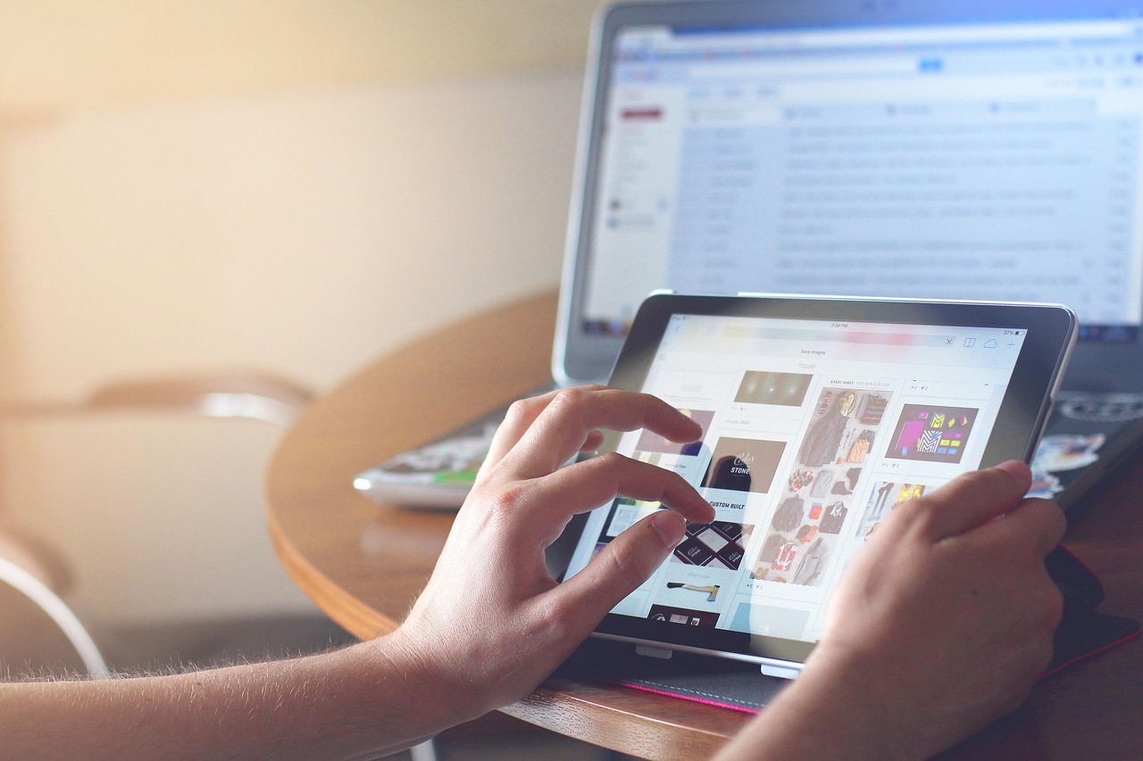 Hands, ipad, tablet — Online Marketing and also the Small Rural Player